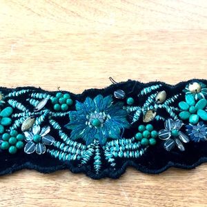 Sash belt with embroidered work